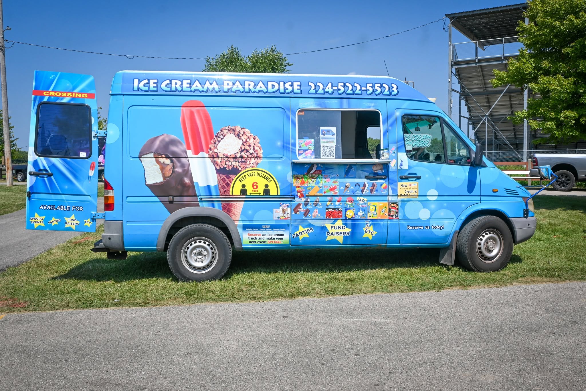 Ice Cream Paradise truck serving happy customers
