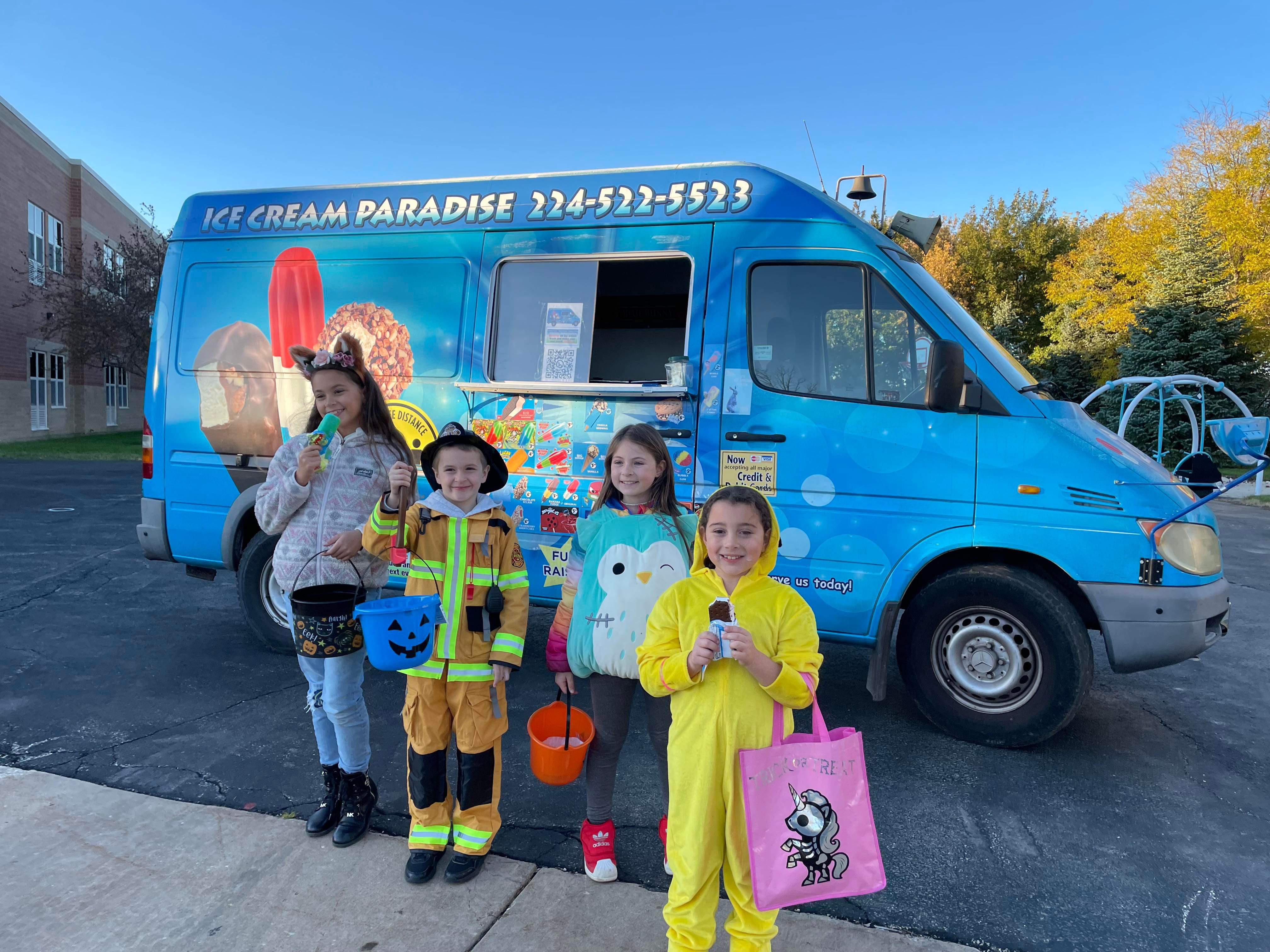 Ice Cream Paradise truck serving customers at an event